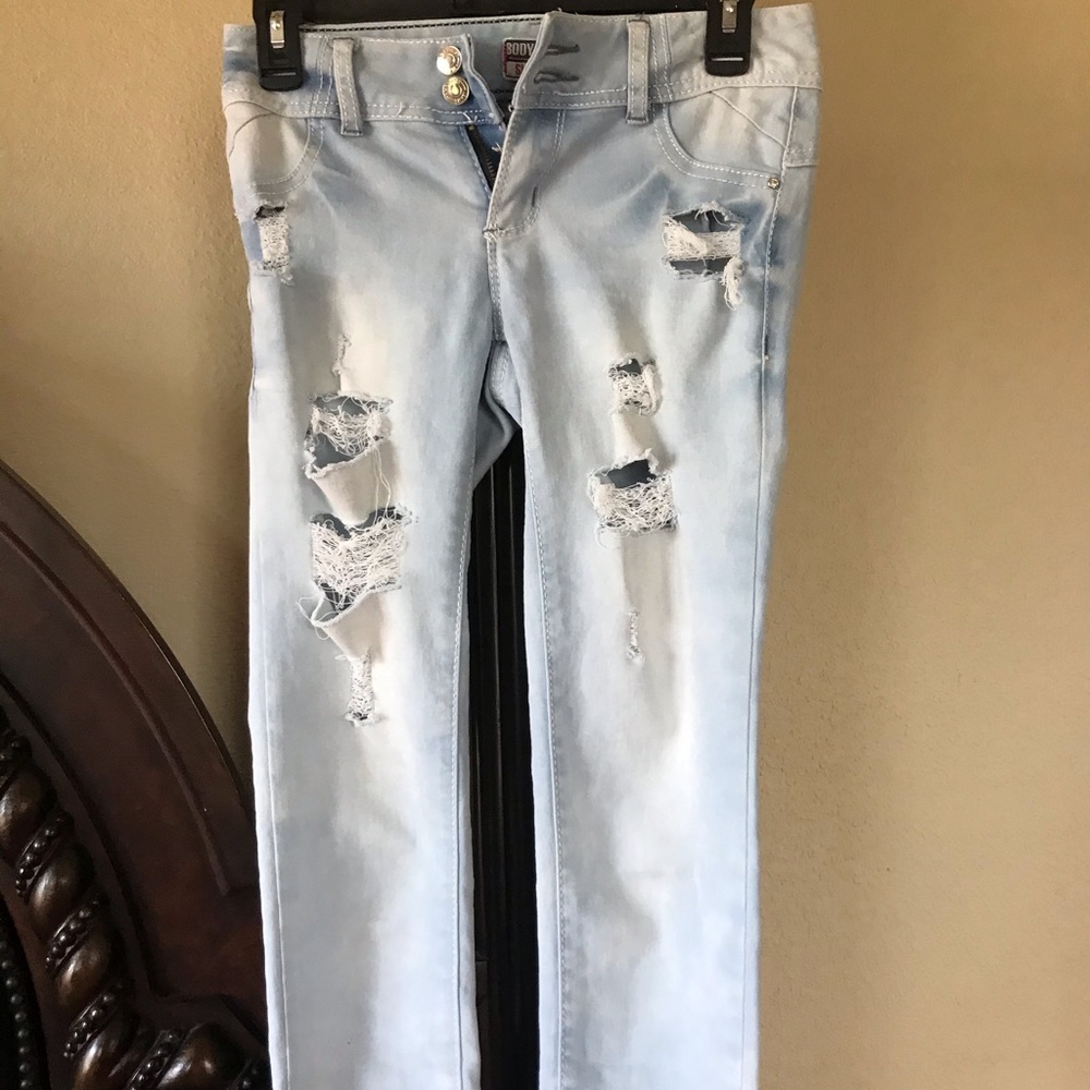 Ripped Light Blue Jeans